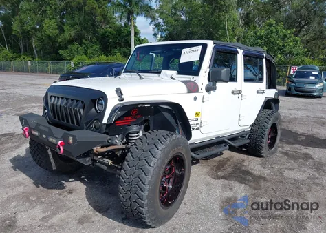 2015 Jeep Wrangler Unlimited Sport из США, поврежденный, VIN 1C4BJWDG1FL610304